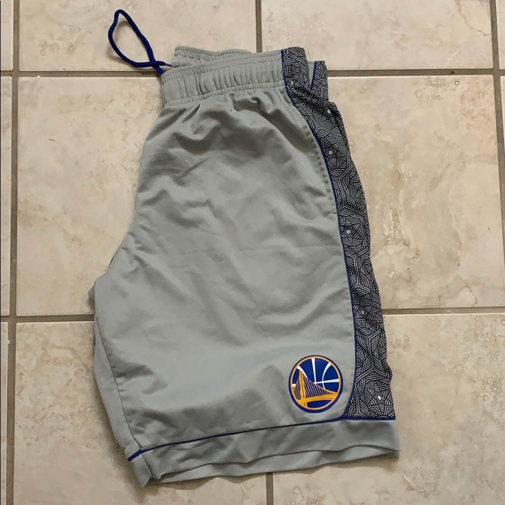 Warriors shorts never worn.